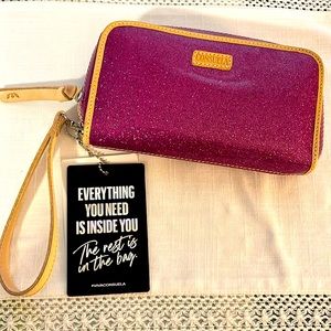 Consuela wristlet wallet in berry color